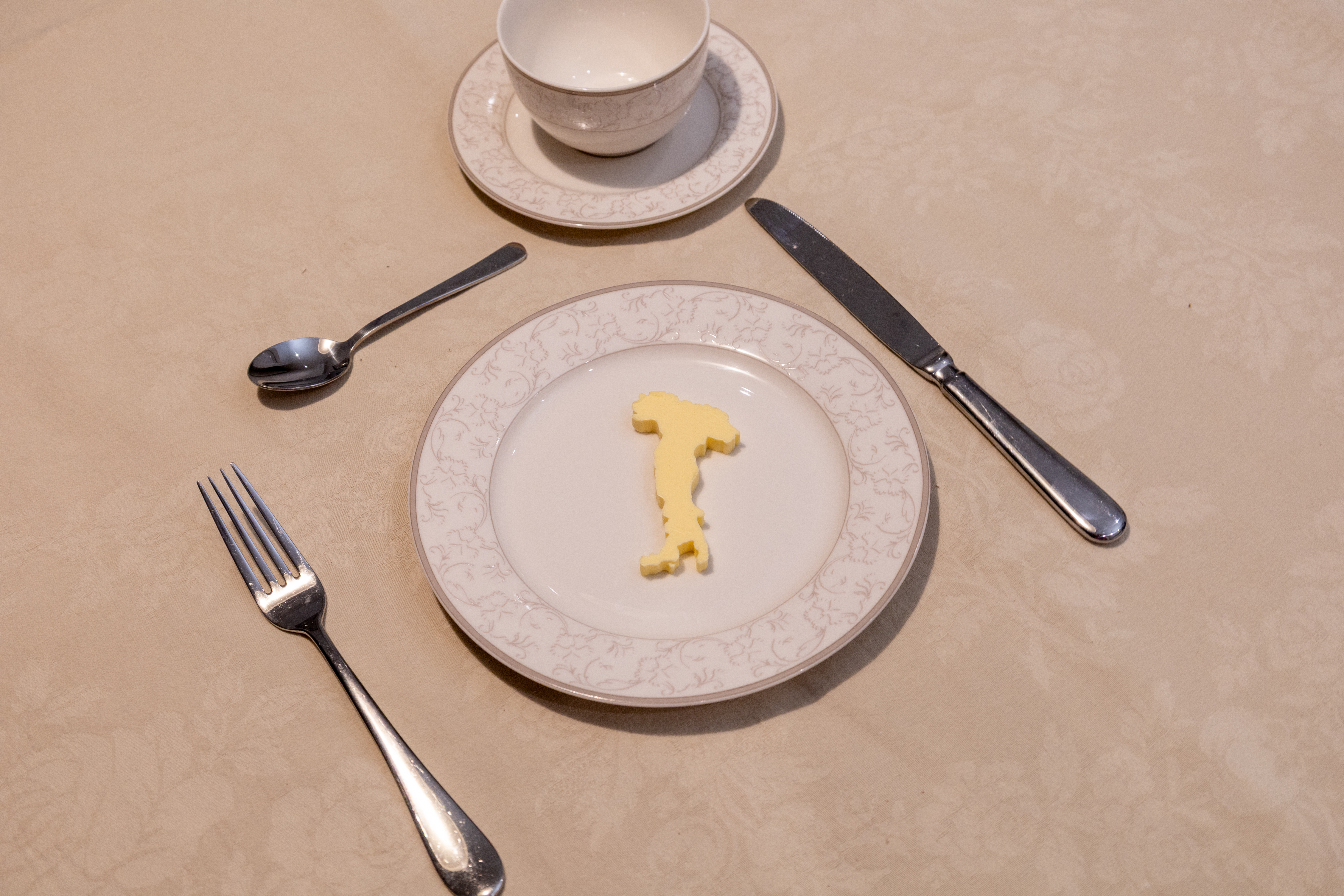 Olaszország alakú vajforma az Allora Hotel számára